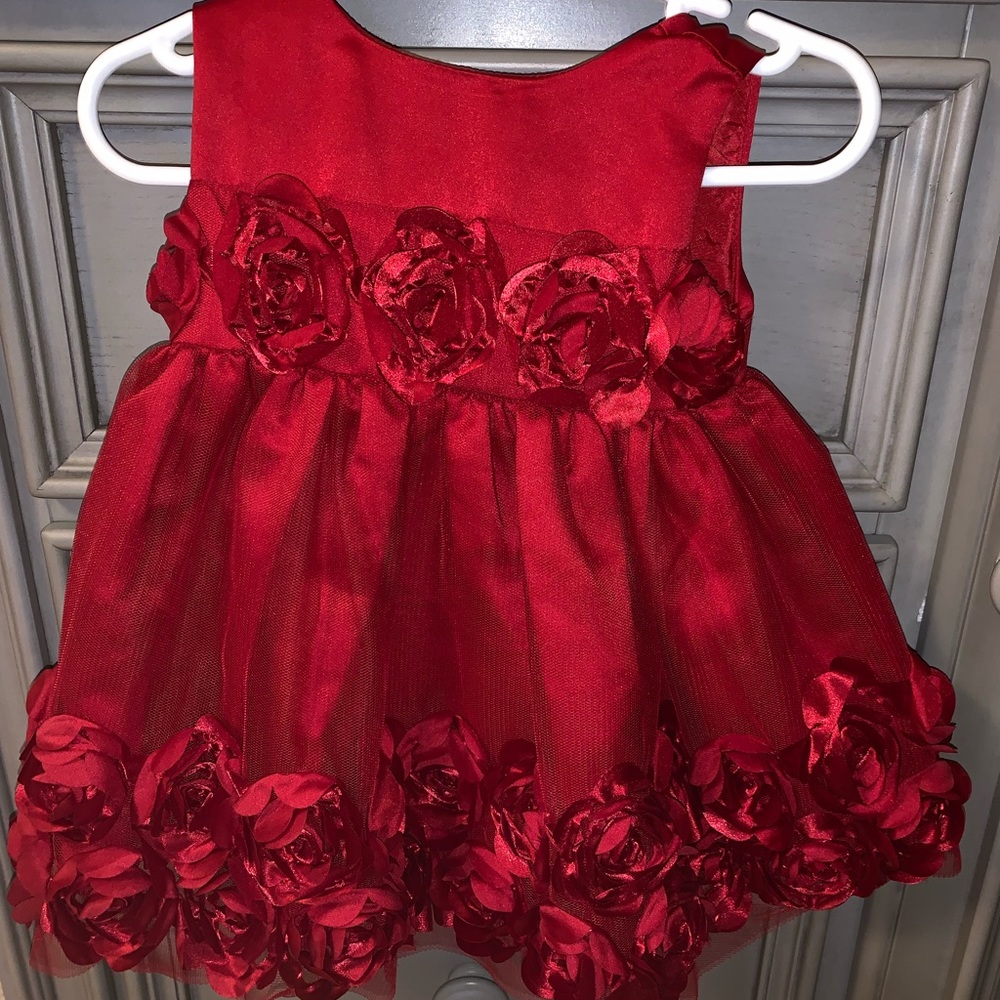 Baby girl’s red dress